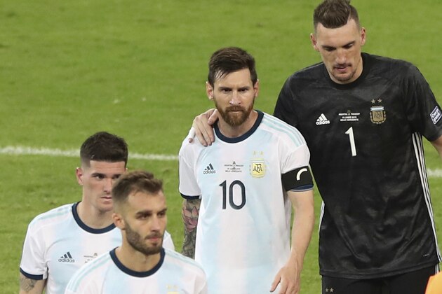 Argentina's Lionel Messi, center, reacts at the end of Copa America Group B soccer match against Paraguay at Mineirao stadium in Belo Horizonte, Brazil, Wednesday, June 19, 2019. (AP Photo/Ricardo Mazalan)