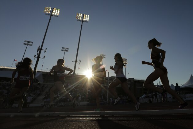 Runners compete in a prelim of the women's 1,500 meters during the NCAA outdoor track and field championships in Austin, Texas, Thursday, June 6, 2019. (AP Photo/Eric Gay)