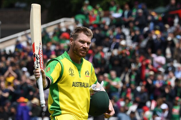Australia's David Warner walks back to the pavilion after losing his wicket for 166 runs during the 2019 Cricket World Cup group stage match between Australia and Bangladesh at Trent Bridge in Nottingham, central England, on June 20, 2019. (Photo by Paul ELLIS / AFP) / RESTRICTED TO EDITORIAL USE        (Photo credit should read PAUL ELLIS/AFP/Getty Images)