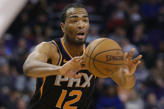 Phoenix Suns forward T.J. Warren (12) in the first half during an NBA basketball game against the Los Angeles Clippers, Friday, Jan. 4, 2019, in Phoenix. (AP Photo/Rick Scuteri)
