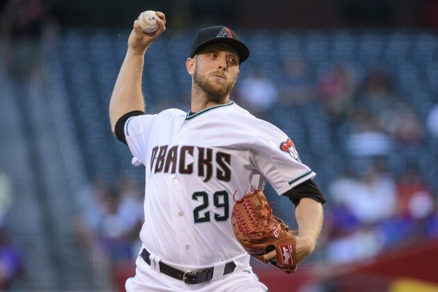 PHOENIX, ARIZONA - JUNE 18: Merrill Kelly #29 of the Arizona Diamondbacks delivers a pitch in the first inning of a MLB game against the Colorado Rockies at Chase Field on June 18, 2019 in Phoenix, Arizona. (Photo by Jennifer Stewart/Getty Images)