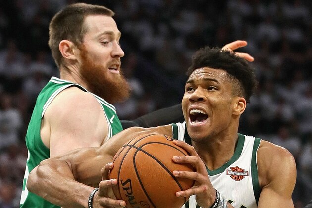 MILWAUKEE, WISCONSIN - APRIL 30: Giannis Antetokounmpo #34 of the Milwaukee Bucks is fouled by Aron Baynes #46 of the Boston Celtics at Fiserv Forum on April 30, 2019 in Milwaukee, Wisconsin. The Bucks defeated the Celtics 123-102. NOTE TO USER: User expressly acknowledges and agrees that, by downloading and or using this photograph, User is consenting to the terms and conditions of the Getty Images License Agreement. (Photo by Jonathan Daniel/Getty Images)