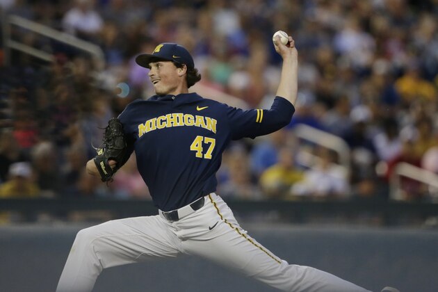 Michigan pitcher Tommy Henry (47) throws against Florida State in the ninth inning of an NCAA College World Series baseball game in Omaha, Neb., Monday, June 17, 2019. Michigan won 2-0. (AP Photo/Nati Harnik)