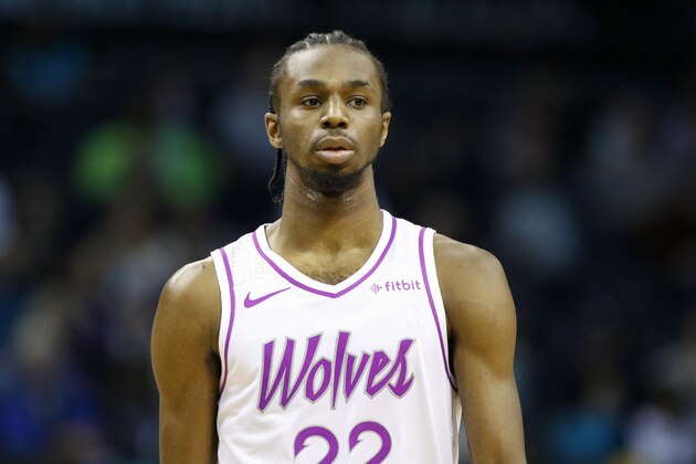 Minnesota Timberwolves forward Andrew Wiggins stands on the court during a break in the action against the Charlotte Hornets in the second half of an NBA basketball game in Charlotte, N.C., Thursday, March 21, 2019. Charlotte won 113-106. (AP Photo/Nell Redmond)