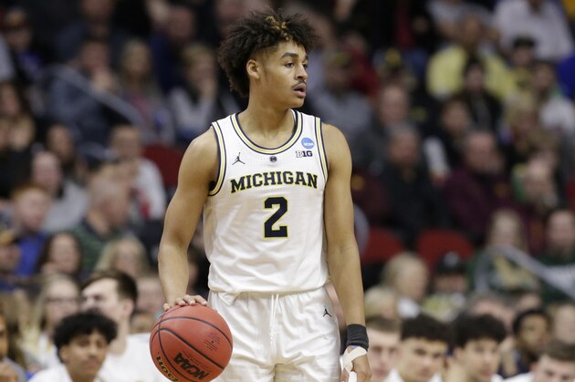 Michigan's Jordan Poole (2) during the second half of a second round men's college basketball game against Florida in the NCAA Tournament, in Des Moines, Iowa, Saturday, March 23, 2019. (AP Photo/Nati Harnik)