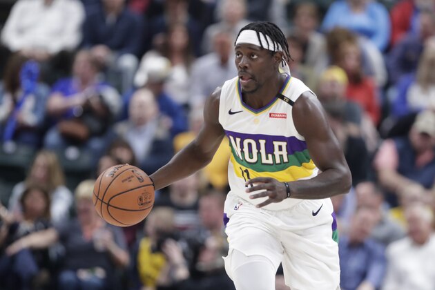 New Orleans Pelicans guard Jrue Holiday (11) plays against the Indiana Pacers during the first half of an NBA basketball game in Indianapolis, Friday, Feb. 22, 2019. (AP Photo/Michael Conroy)