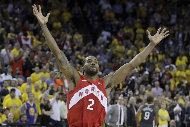 Toronto Raptors forward Kawhi Leonard celebrates after the Raptors defeated the Golden State Warriors in Game 6 of basketball's NBA Finals in Oakland, Calif., Thursday, June 13, 2019. (AP Photo/Ben Margot)