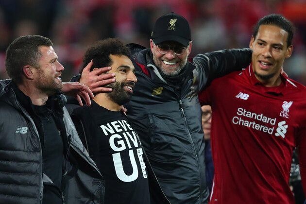 LIVERPOOL, ENGLAND - MAY 07:  Jurgen Klopp, Manager of Liverpool and Mohamed Salah of Liverpool and team mates celebrate after the UEFA Champions League Semi Final second leg match between Liverpool and Barcelona at Anfield on May 07, 2019 in Liverpool, England. (Photo by Clive Brunskill/Getty Images)