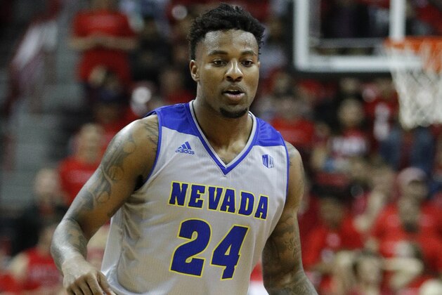 Nevada's Jordan Caroline (24) plays against UNLV during the second half of an NCAA college basketball game Tuesday, Jan. 29, 2019, in Las Vegas. Nevada won 87-70. (AP Photo/John Locher)