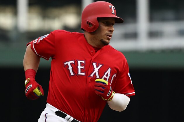 ARLINGTON, TEXAS - JUNE 19:  Asdrubal Cabrera #14 of the Texas Rangers runs after hitting a homerun against the Cleveland Indians in the second inning at Globe Life Park in Arlington on June 19, 2019 in Arlington, Texas. (Photo by Ronald Martinez/Getty Images)