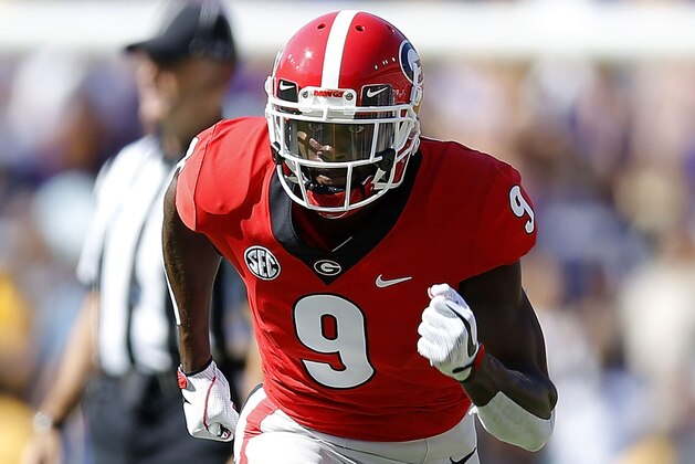 BATON ROUGE, LA - OCTOBER 13:  Jeremiah Holloman #9 of the Georgia Bulldogs runs during a game against the LSU Tigers at Tiger Stadium on October 13, 2018 in Baton Rouge, Louisiana.  (Photo by Jonathan Bachman/Getty Images)