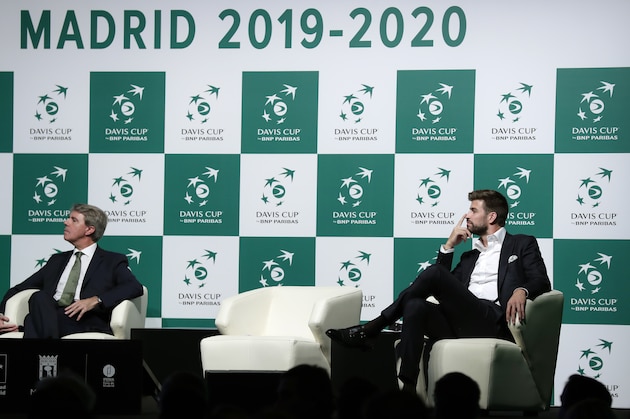 FC Barcelona soccer player and founder of investment group Kosmos, Gerard Pique, right, attends the presentation of the city of Madrid as hosts of the new Davis Cup for the next two years in Madrid, Spain, Wednesday, Oct. 17, 2018. (AP Photo/Manu Fernandez)