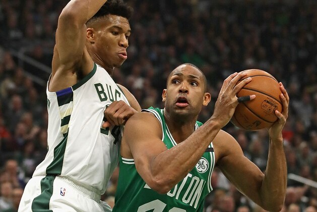 Al Horford #42 of the Boston Celtics
tries to move against Giannis Antetokounmpo #34 of the Milwaukee Bucks at Fiserv Forum on May 08, 2019 in Milwaukee, Wisconsin. NOTE TO USER: User expressly acknowledges and agrees that, by downloading and or using this photograph, User is consenting to the terms and conditions of the Getty Images License Agreement. (Photo by Jonathan Daniel/Getty Images)