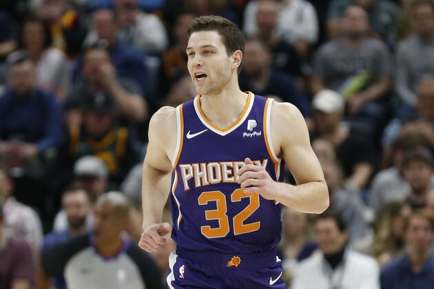 Phoenix Suns guard Jimmer Fredette (32) runs up court during the first half of an NBA basketball game against the Utah Jazz Monday, March 25, 2019, in Salt Lake City. (AP Photo/Rick Bowmer)