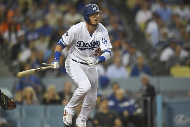 LOS ANGELES, CA - JUNE 18: Cody Bellinger #35 of the Los Angeles Dodgers breads his bat and lines out in the first inning against the San Francisco Giants at Dodger Stadium on June 18, 2019 in Los Angeles, California. (Photo by John McCoy/Getty Images)