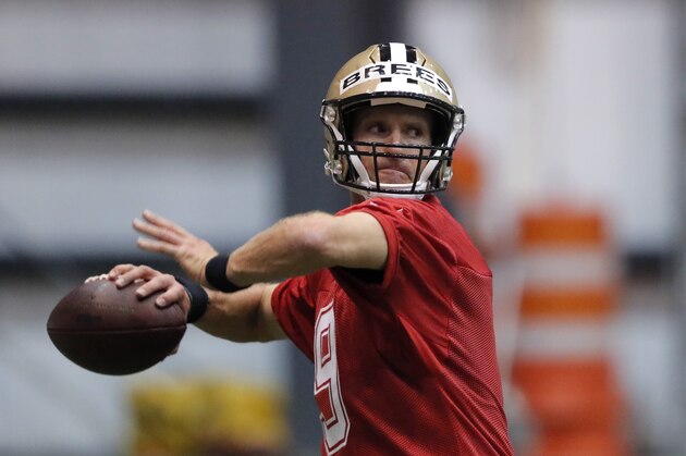 New Orleans Saints quarterback Drew Brees (9) runs a drill at their NFL football training facility in Metairie, La., Wednesday, June 12, 2019. (AP Photo/Gerald Herbert)