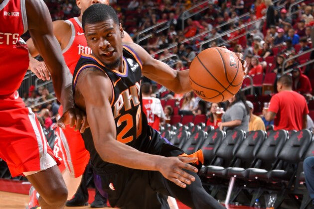 HOUSTON, TX - APRIL 7: Josh Jackson #20 of the Phoenix Suns handles the ball against the Houston Rockets on April 7, 2019 at the Toyota Center in Houston, Texas. NOTE TO USER: User expressly acknowledges and agrees that, by downloading and/or using this photograph, user is consenting to the terms and conditions of the Getty Images License Agreement. Mandatory Copyright Notice: Copyright 2019 NBAE (Photo by Bill Baptist/NBAE via Getty Images)