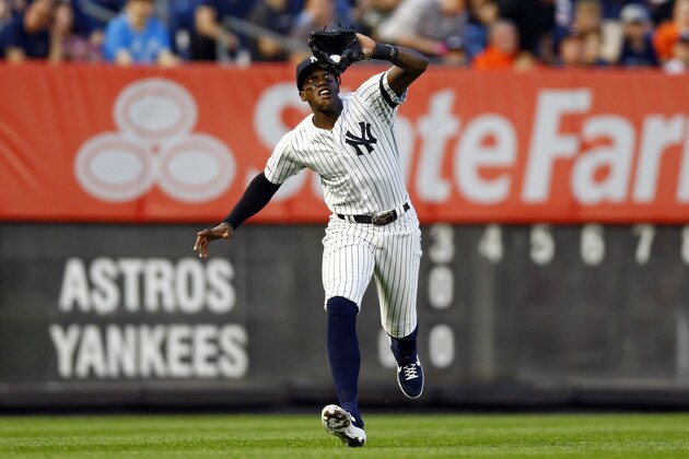 New York Yankees left fielder Cameron Maybin catches a fly ball by Houston Astros' Yordan Alvarez dduring the fourth inning of a baseball game Thursday, June 20, 2019, in New York. (AP Photo/Adam Hunger)