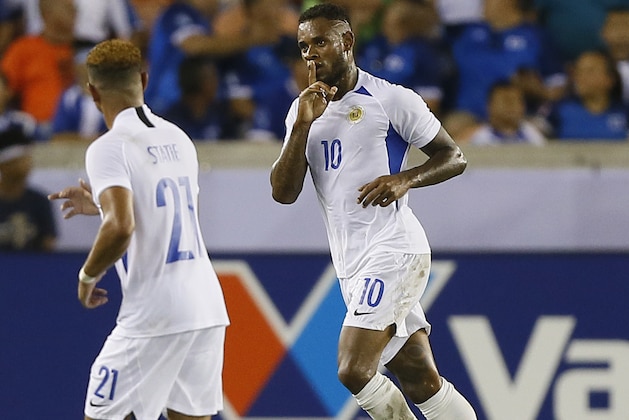 HOUSTON, TEXAS - JUNE 21: Leandro Bacuna #10 of Curacao scores against Honduras in the first half during the CONCACAF Gold Cup Group C  game between Honduras and Curacao at BBVA Stadium on June 21, 2019 in Houston,  (Photo by Bob Levey/Getty Images)