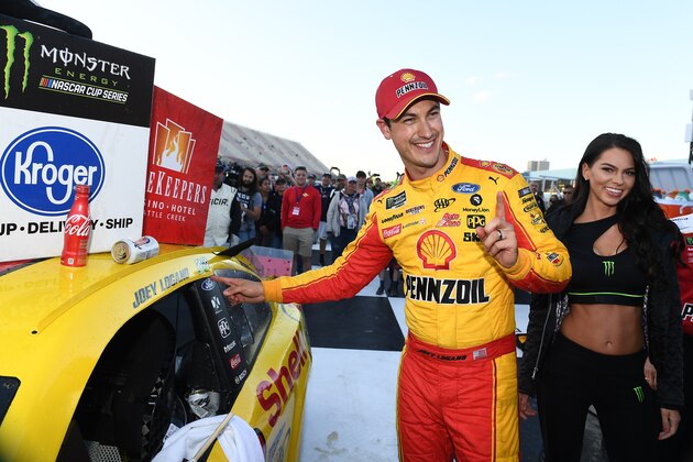 BROOKLYN, MICHIGAN - JUNE 10: Joey Logano, driver of the #22 Shell Pennzoil Ford, poses with the winner's sticker after the Monster Energy NASCAR Cup Series FireKeepers Casino 400 at Michigan International Speedway on June 10, 2019 in Brooklyn, Michigan. (Photo by Stacy Revere/Getty Images)