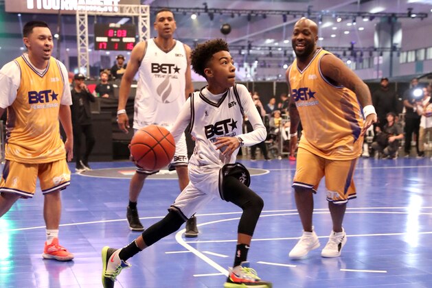 LOS ANGELES, CALIFORNIA - JUNE 22: (L-R) Miles Brown (C) plays in the BETX Celebrity Basketball Game Sponsored By Sprite during the BET Experience at Los Angeles Convention Center on June 22, 2019 in Los Angeles, California. (Photo by Bennett Raglin/Getty Images for BET)