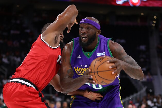 DETROIT, MI - JUNE 22: Reggie Evans #30 of 3 Headed Monsters drives to the basket against Sam Young #4 of Trilogy during week one of the BIG3 three on three basketball league at Little Caesars Arena on June 22, 2019 in Detroit, Michigan. (Photo by Gregory Shamus/Big3/Getty Images)