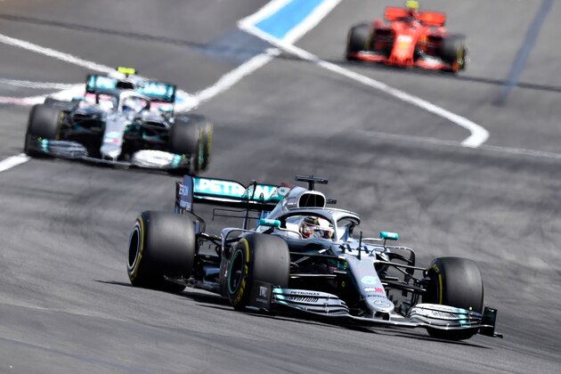 Mercedes' British driver Lewis Hamilton (front) leads ahead of Mercedes' Finnish driver Valtteri Bottas and Ferrari's Monegasque driver Charles Leclerc during the Formula One Grand Prix de France at the Circuit Paul Ricard in Le Castellet, southern France, on June 23, 2019. (Photo by GERARD JULIEN / AFP)        (Photo credit should read GERARD JULIEN/AFP/Getty Images)