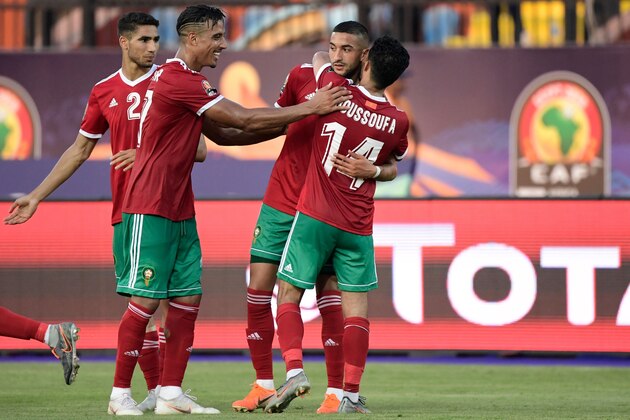 Morocco's players celebrate their goal during the 2019 Africa Cup of Nations (CAN) football match between Morocco and Namibia at the Al Salam Stadium in Cairo on June 23, 2019. (Photo by JAVIER SORIANO / AFP)        (Photo credit should read JAVIER SORIANO/AFP/Getty Images)