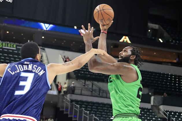 INDIANAPOLIS, INDIANA - JUNE 23: Greg Oden of the Aliens shoots over Chris Johnson of the Triplets during Week One of the BIG3 three on three basketball league at Bankers Life Fieldhouse on June 23, 2019 in Indianapolis, Indiana. (Photo by Andy Lyons/BIG3/Getty Images)