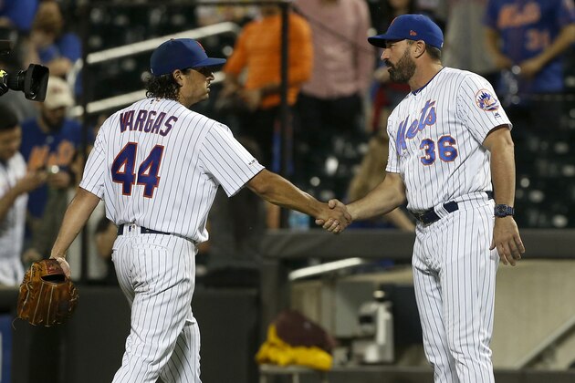 NEW YORK, NEW YORK - JUNE 05:   Jason Vargas #44 of the New York Mets celebrates his shutout against the San Francisco Giants with manager Mickey Callaway #36 at Citi Field on June 05, 2019 in New York City. (Photo by Jim McIsaac/Getty Images)