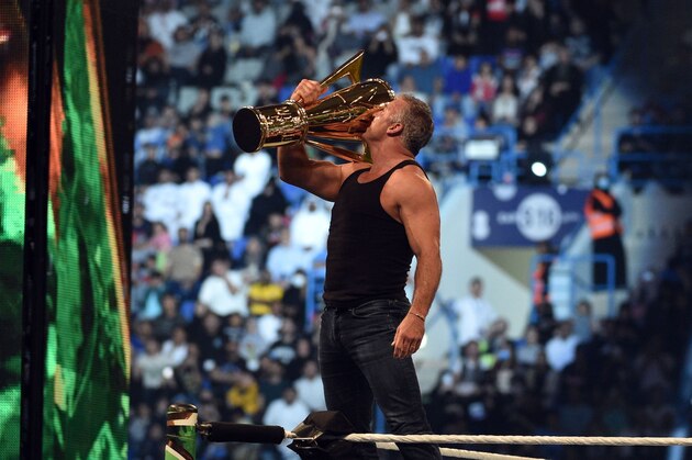 Shane McMahon, SmackDown commissioner and minority owner of WWE, raises the WWE World Cup trophy following the match as part of as part of the World Wrestling Entertainment (WWE) Crown Jewel pay-per-view at the King Saud University Stadium in Riyadh on November 2, 2018. (Photo by Fayez Nureldine / AFP)        (Photo credit should read FAYEZ NURELDINE/AFP/Getty Images)