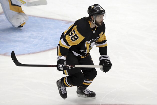 Pittsburgh Penguins' Kris Letang skates during an NHL hockey game against the Detroit Red Wings in Pittsburgh, Thursday, April 4, 2019. (AP Photo/Gene J. Puskar)
