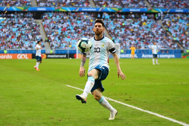 PORTO ALEGRE, BRAZIL - JUNE 23: Lionel Messi of Argentina in action during the Copa America Brazil 2019 group B match between Qatar and Argentina at Arena do Gremio on June 23, 2019 in Porto Alegre, Brazil. (Photo by Chris Brunskill/Fantasista/Getty Images)