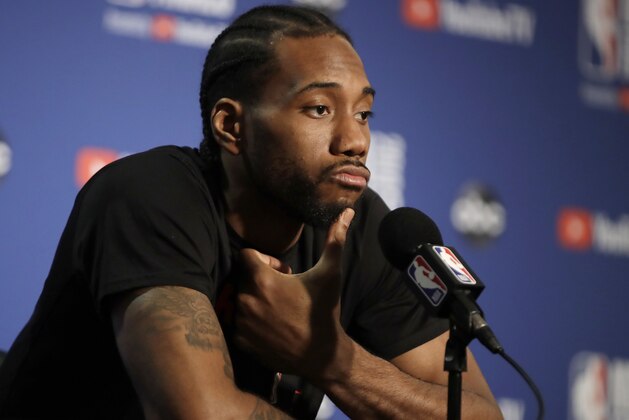Toronto Raptors' Kawhi Leonard ponders a question during a media conference Thursday, June 6, 2019, in Oakland, Calif. (AP Photo/Ben Margot)