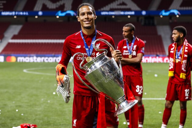MADRID, SPAIN - JUNE 1: Virgil van Dijk of Liverpool FC, with the trophy during the UEFA Champions League  match between Tottenham Hotspur v Liverpool at the Wanda Metropolitano on June 1, 2019 in Madrid Spain (Photo by David S. Bustamante/Soccrates/Getty Images)