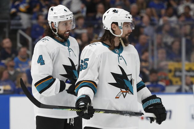 San Jose Sharks defenseman Erik Karlsson (65), of Sweden, is congratulated by Brenden Dillon (4) after Karlsson scored a goal against the St. Louis Blues during the first period in Game 3 of the NHL hockey Stanley Cup Western Conference final series Wednesday, May 15, 2019, in St. Louis. (AP Photo/Jeff Roberson)