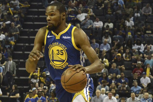Golden State Warriors forward Kevin Durant (35) plays in the first half of an NBA basketball game against the Memphis Grizzlies Wednesday, April 10, 2019, in Memphis, Tenn. (AP Photo/Brandon Dill)