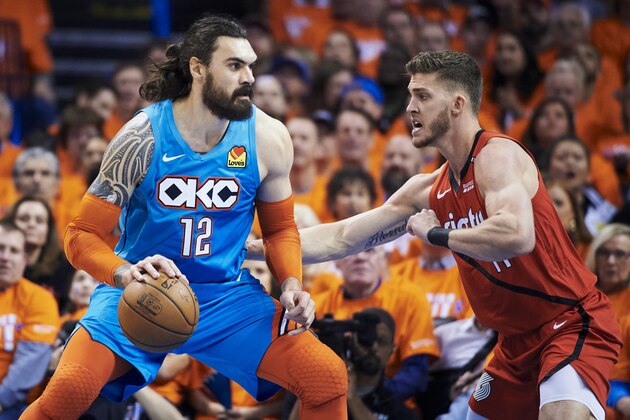 OKLAHOMA CITY, OKLAHOMA - APRIL 19: Steven Adams #12 of the Oklahoma City Thunder backs down Meyers Leonard #11 of the Portland Trail Blazers during game three of the Western Conference quarterfinals at Chesapeake Energy Arena on April 19, 2019 in Oklahoma City, Oklahoma. NOTE TO USER: User expressly acknowledges and agrees that, by downloading and or using this photograph, User is consenting to the terms and conditions of the Getty Images License Agreement.  (Photo by Cooper Neill/Getty Images)