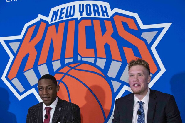 New York Knicks NBA basketball draft picks RJ Barrett, left, and Ignas Brazdeikis speak to reporters during a news conference, Friday, June 21, 2019, at Madison Square Garden in New York. (AP Photo/Mary Altaffer)