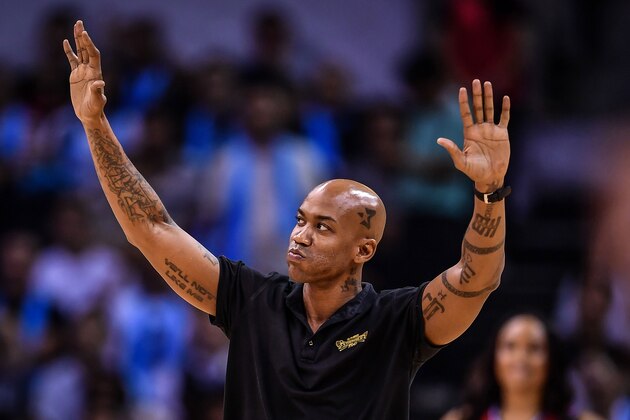 US former NBA player Stephon Marbury waves during the preseason NBA basketball game between Dallas Mavericks and Philadelphia 76ers in Shenzhen, in China's southern Guangdong province on October 8, 2018. (Photo by STR / AFP)        (Photo credit should read STR/AFP/Getty Images)