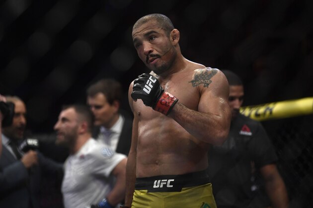 Brazilian fighter Jose Aldo (R) competes against Australian fighter Alexander Volkanovski (off frame) during their men's featerweight bout at the Ultimate Fighting Championship 237 event (UFC 237) at Jeunesse Arena in Rio de Janeiro on May 11, 2019. (Photo by Mauro Pimentel / AFP)        (Photo credit should read MAURO PIMENTEL/AFP/Getty Images)