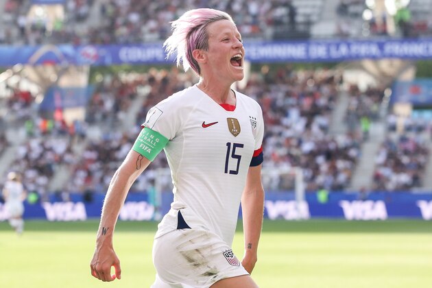 REIMS, FRANCE - JUNE 24: #15 Megan Rapinoe of USA celebrates her the second goal by penalty during the 2019 FIFA Women's World Cup France Round Of 16 match between Spain and USA at Stade Auguste Delaune on June 24, 2019 in Reims, France. (Photo by Zhizhao Wu/Getty Images)