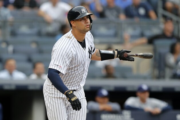 NEW YORK, NEW YORK - JUNE 19:   Gary Sanchez #24 of the New York Yankees watches the flight of his first inning three run home run against the Tampa Bay Rays at Yankee Stadium on June 19, 2019 in New York City. (Photo by Jim McIsaac/Getty Images)