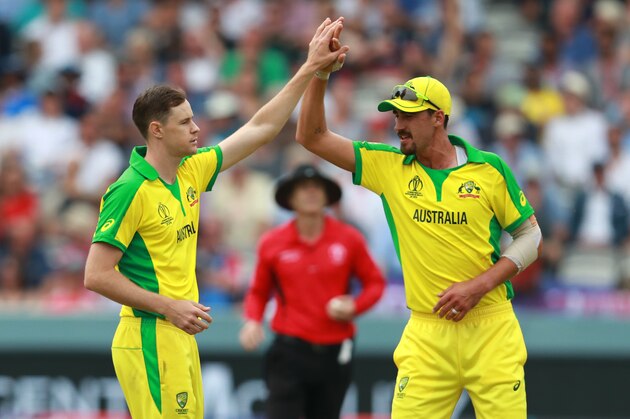 LONDON, ENGLAND - JUNE 25:  Jason Behrendorff (L) of Australia celebrates with team mate Mitchell Starc after taking the wicket of Moeen Ali during the Group Stage match of the ICC Cricket World Cup 2019 between England and Australia at Lords on June 25, 2019 in London, England. (Photo by David Rogers/Getty Images)