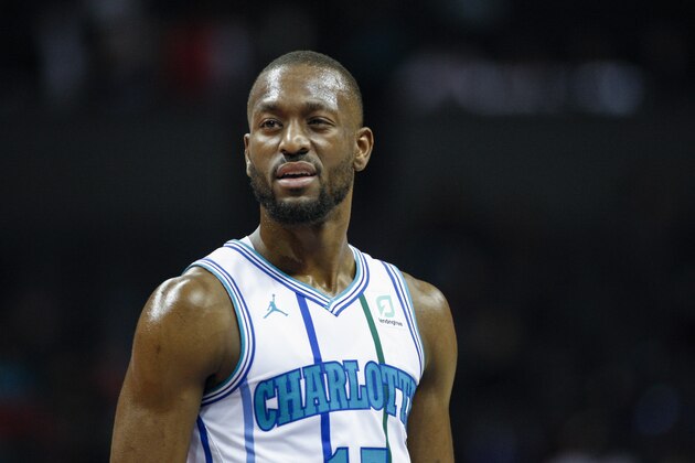 Charlotte Hornets guard Kemba Walker stands on the court during a break in the action against the Washington Wizards in the first half of an NBA basketball game in Charlotte, N.C., Friday, March 8, 2019. Charlotte won 112-111. (AP Photo/Nell Redmond)