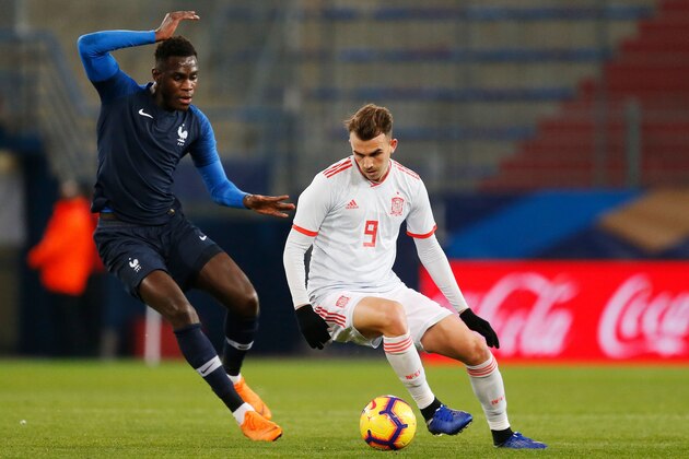 France's defender Moussa Niakhate vies for the ball with Spain's forward Borja Mayoral during the friendly under-21 football match between France and Spain at the Michel d'Ornano Stadium in the northwestern city of Caen, northwestern France, on November 19, 2018. (Photo by CHARLY TRIBALLEAU / AFP)        (Photo credit should read CHARLY TRIBALLEAU/AFP/Getty Images)
