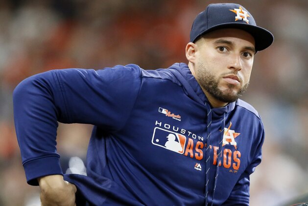 HOUSTON, TEXAS - MAY 25: George Springer #4 of the Houston Astros looks on from the dugout against the Boston Red Sox at Minute Maid Park on May 25, 2019 in Houston, Texas.Springer placed on the 10 dqy IL with a hamstring injury. (Photo by Bob Levey/Getty Images)