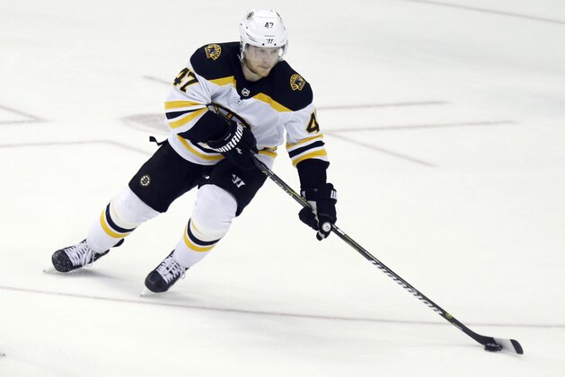Boston Bruins defenseman Torey Krug carries the puck against the Columbus Blue Jackets during Game 4 of an NHL hockey second-round playoff series in Columbus, Ohio, Thursday, May 2, 2019. The Bruins won 4-1. (AP Photo/Paul Vernon)