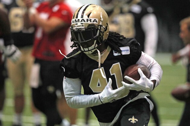 New Orleans Saints running back Alvin Kamara (41) runs through drills during an NFL football practice in Metairie, La., Tuesday, June 4, 2019. (AP Photo/Gerald Herbert)