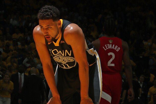 OAKLAND, CA - JUNE 13: Klay Thompson #11 of the Golden State Warriors looks on prior to his foul shot after injuring his knee against the Toronto Raptors during Game Six of the 2019 NBA Finals on June 13, 2019 at ORACLE Arena in Oakland, California. NOTE TO USER: User expressly acknowledges and agrees that, by downloading and/or using this photograph, user is consenting to the terms and conditions of Getty Images License Agreement. Mandatory Copyright Notice: Copyright 2019 NBAE (Photo by Nathaniel S. Butler/NBAE via Getty Images)